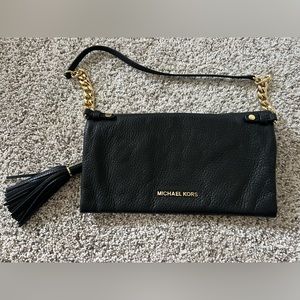 Michael Kors, black leather, gold chain shoulder bag.